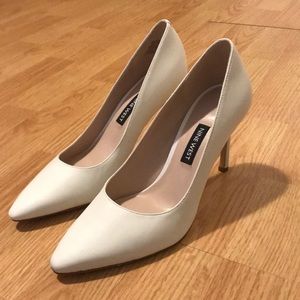 New White Leather Nine West Pumps